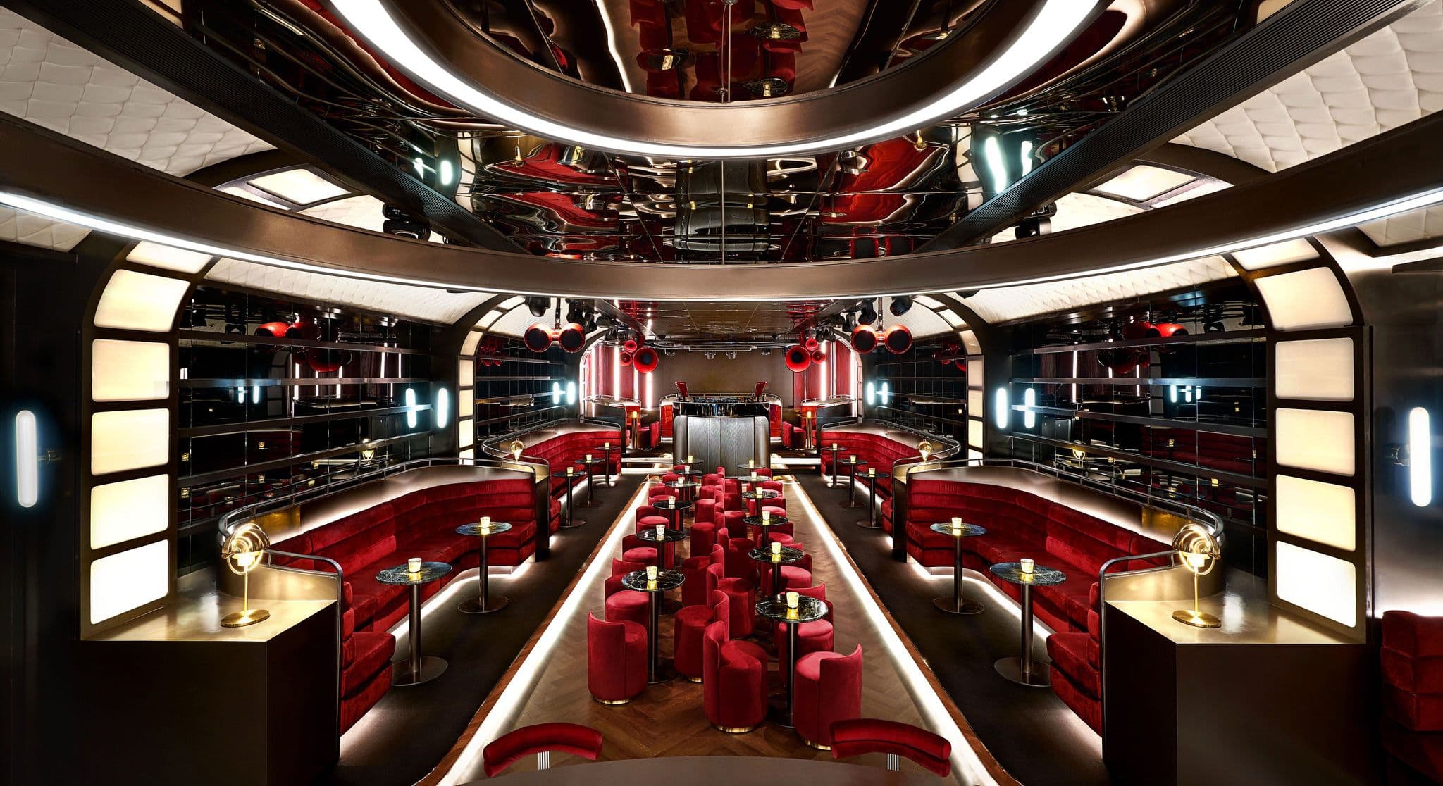 Experience a synchronized bar and nightclub ambiance at Echelon Bangkok, located on the 3rd floor of Marché Thonglor. This futuristic train-themed bar in Thonglor offers a first-class vibe that will make you feel like you're drinking on a high-end train. Additionally, enjoy an exceptional sound quality experience from the Void Acoustics speakers.